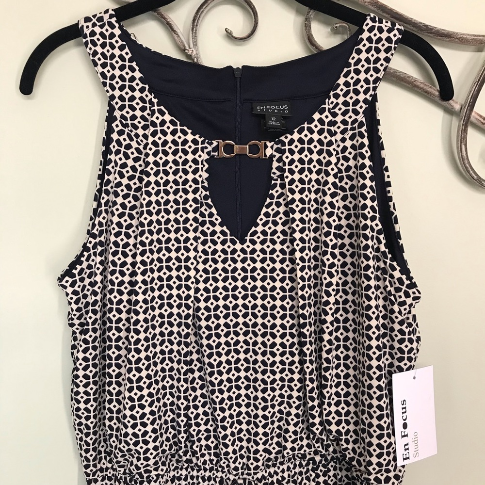 Cute romper. Brand new. Enfocus size 12